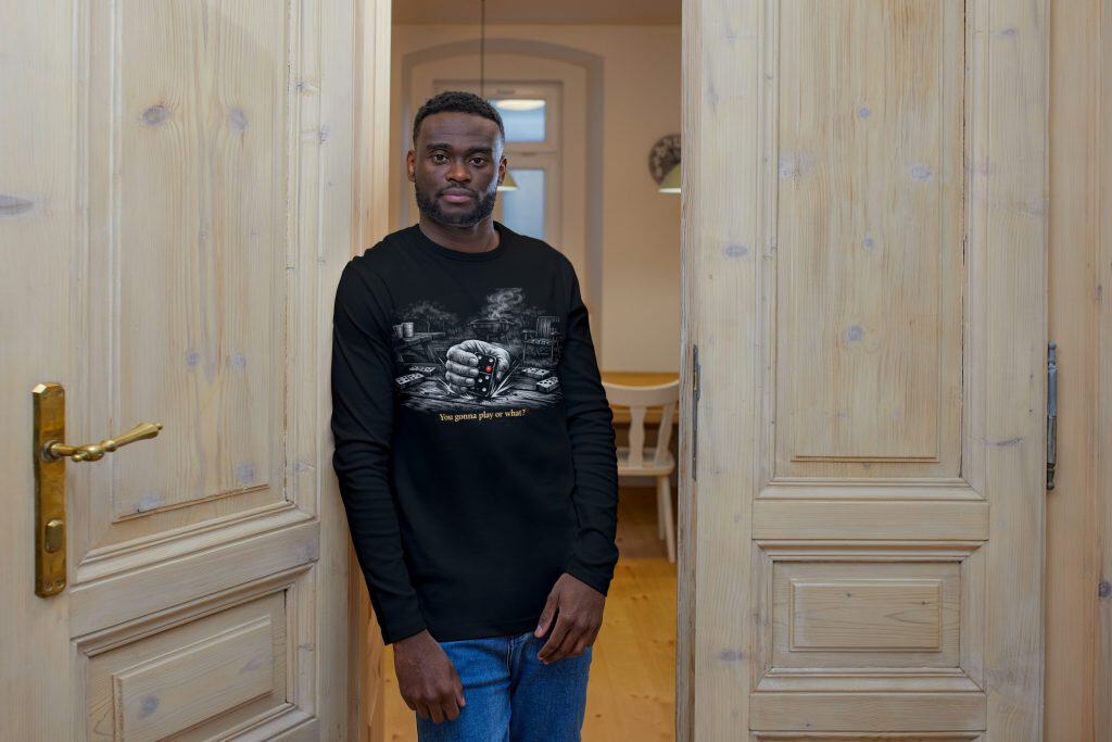 Male portrait in a cozy home setting, standing between wooden doors, casual attire, confident expres.