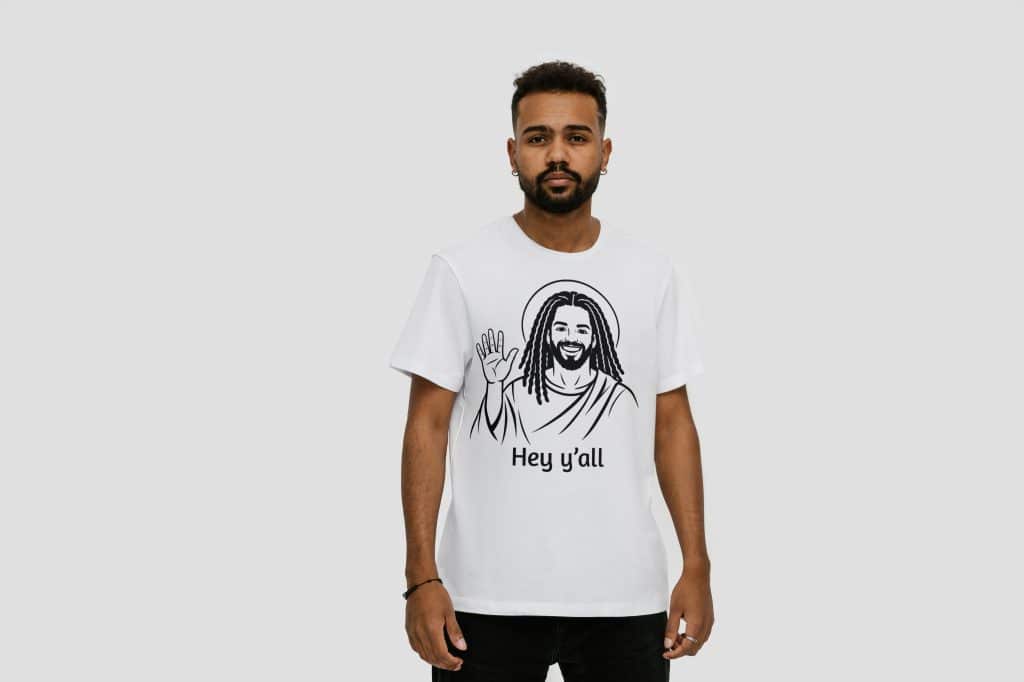 Man wearing Cousins Dozens T-shirt featuring Jesus illustration and "Hey y'all" text.