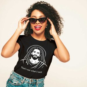 Cousins Dozens – Stylish Woman with Sunglasses Trendy woman wearing sunglasses and a graphic T-shirt with a beard illustration, smiling confidently.
