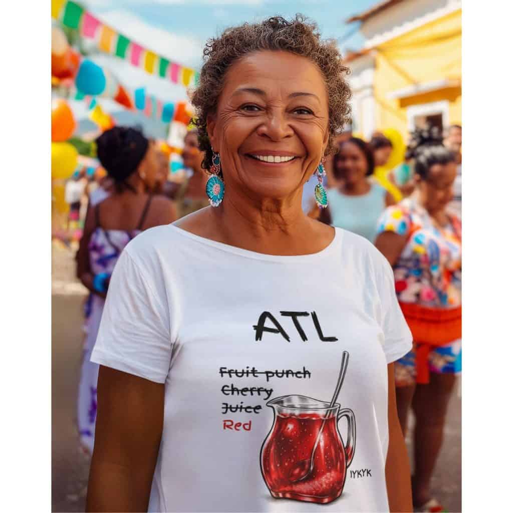 Older woman smiling at a lively outdoor festival with colorful decorations and diverse attendees in.