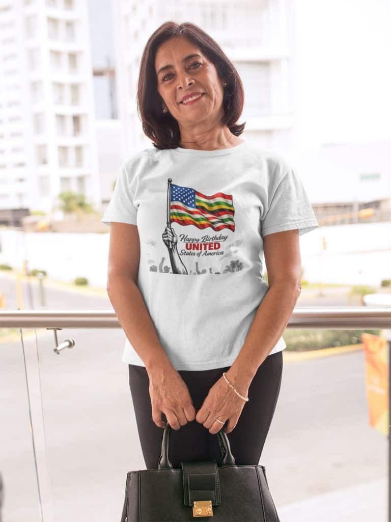 Woman wearing a patriotic T-shirt with American flag and "Happy Birthday United States of America" t.