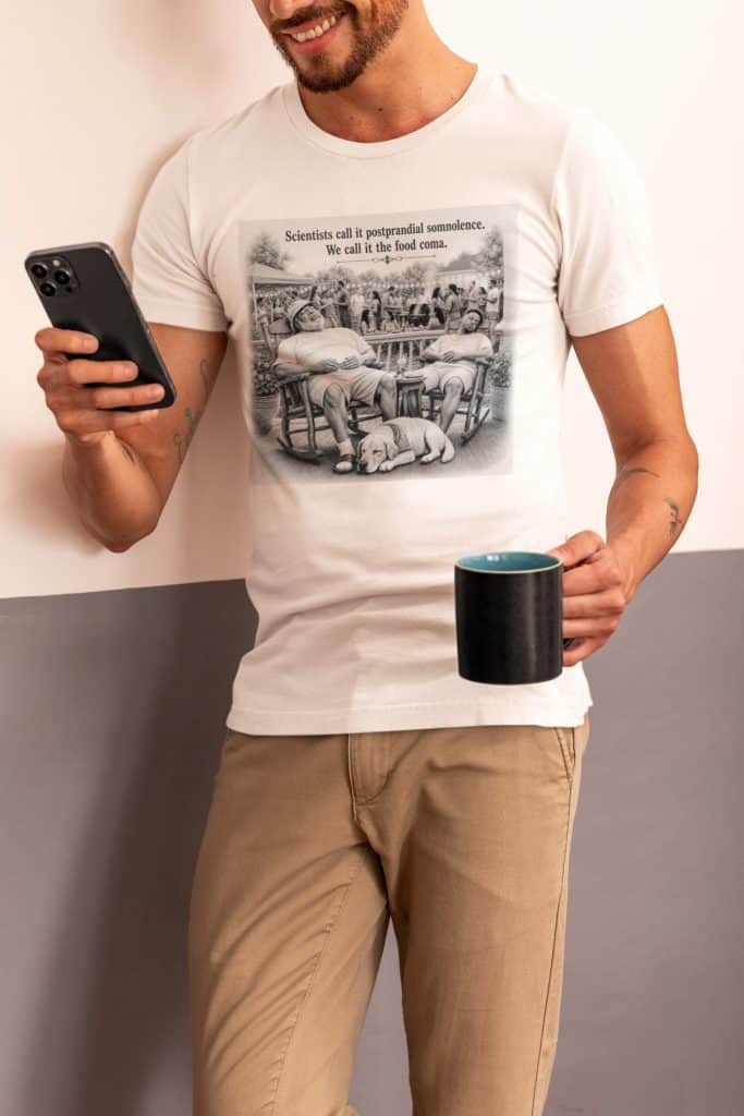 Man wearing Cousins Dozens T-shirt with scientific illustration, holding a coffee mug and phone.